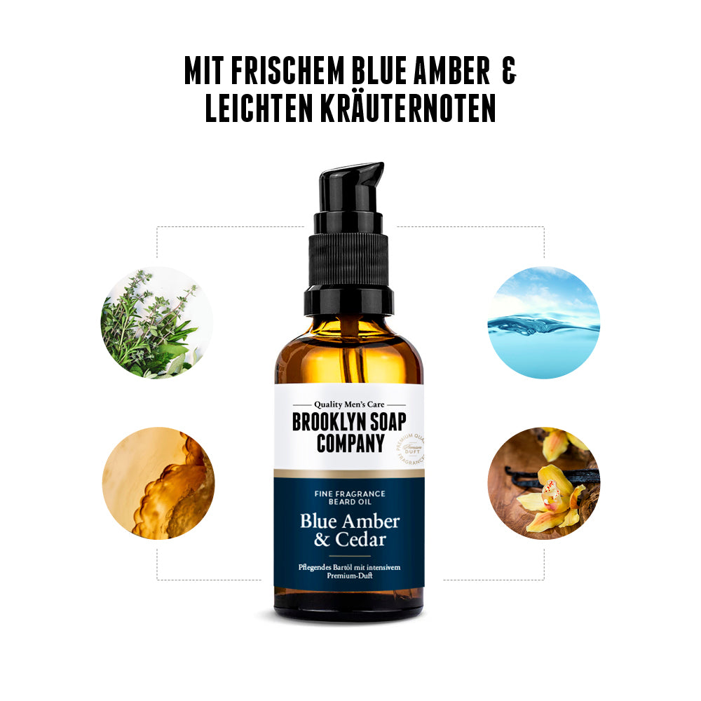 Brooklyn Soap Bartöl Blue Amber & Cedar – präsentiert mit Duftnoten aus Amber, Kräutern, Wasserfrische und Vanille, symbolisiert durch natürliche Inhaltsstoffe rund um die Flasche.