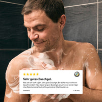 Body Wash von der Brooklyn Soap Company auf der Haut – sanfte Reinigung mit cremigem Schaum für gepflegte, saubere Männerhaut. Darunter eine positive Kundenbewertung.